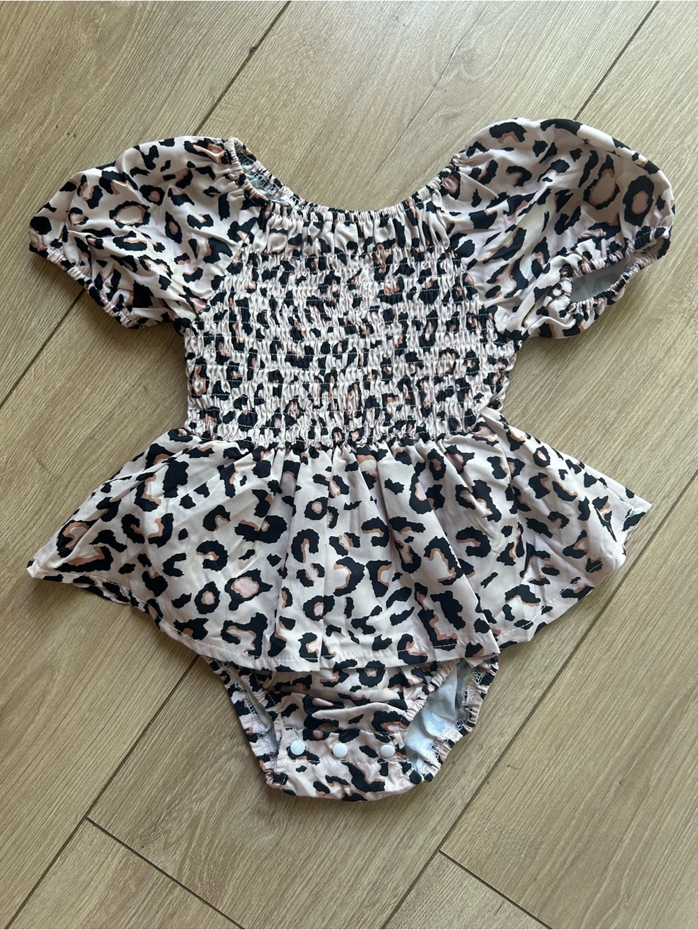Leopard Print Smocked Peplum Baby Romper - Pink & Black